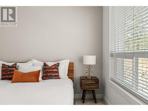 610 Academy Way Unit# 117, Kelowna, BC - Indoor Photo Showing Bedroom