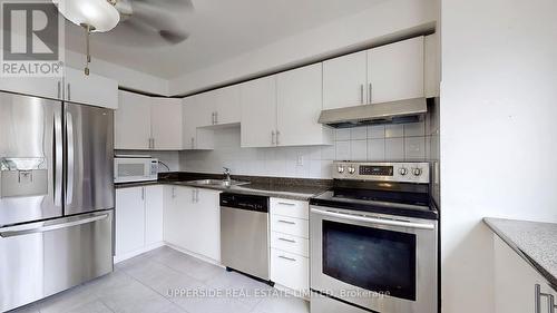 23 Candy Courtway, Toronto (Newtonbrook West), ON - Indoor Photo Showing Kitchen With Double Sink