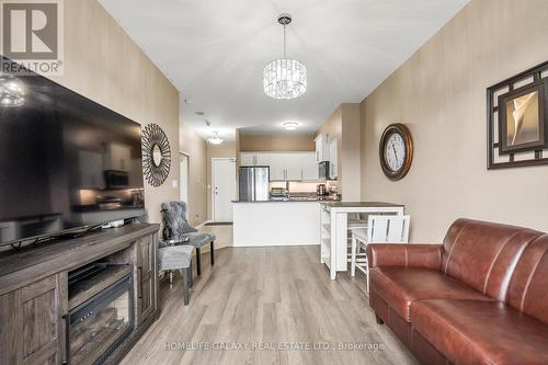 1D - 6 Rosebank Drive, Toronto (Malvern), ON - Indoor Photo Showing Living Room With Fireplace