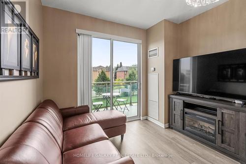 1D - 6 Rosebank Drive, Toronto (Malvern), ON - Indoor Photo Showing Living Room With Fireplace