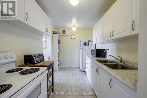 1209 - 335 Driftwood Avenue, Toronto (Black Creek), ON - Indoor Photo Showing Kitchen With Double Sink