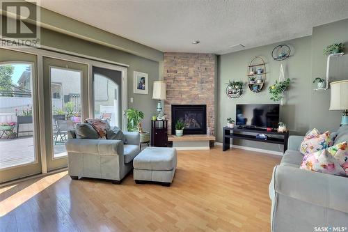 3929 Gordon Road, Regina, SK - Indoor Photo Showing Living Room With Fireplace