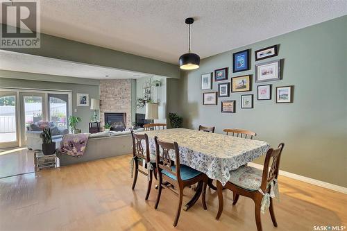 3929 Gordon Road, Regina, SK - Indoor Photo Showing Dining Room With Fireplace