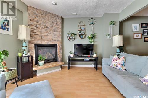 3929 Gordon Road, Regina, SK - Indoor Photo Showing Living Room With Fireplace