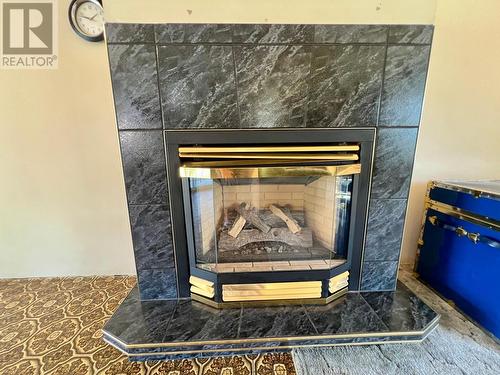 614 12Th  Street, Castlegar, BC - Indoor Photo Showing Other Room With Fireplace