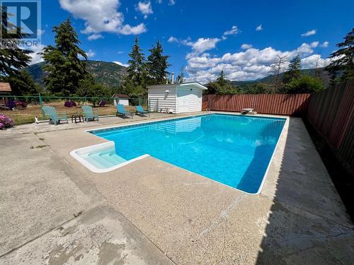 614 12Th  Street, Castlegar, BC - Outdoor With In Ground Pool With Backyard