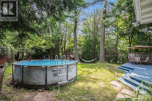 7 Eastpark Drive, Ottawa, ON - Outdoor With Above Ground Pool With Backyard