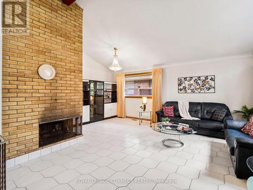 145 Cass Avenue, Toronto (Tam O'Shanter-Sullivan), ON - Indoor Photo Showing Living Room With Fireplace