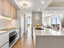 Cuisine - 1701-5905 Boul. Du Quartier, Brossard, QC  - Indoor Photo Showing Kitchen With Double Sink With Upgraded Kitchen 