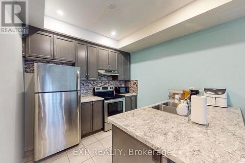 12 - 35 Heron Park Place, Toronto (West Hill), ON - Indoor Photo Showing Kitchen With Stainless Steel Kitchen