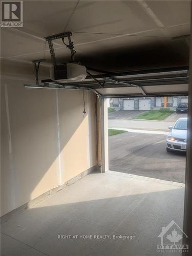 22 Margaret Graham Terrace, Smiths Falls, ON - Indoor Photo Showing Garage