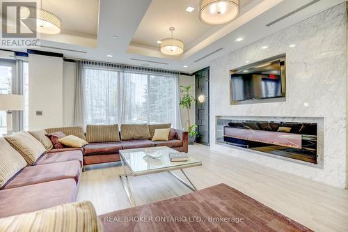 703 - 18 Graydon Hall Drive, Toronto (Parkwoods-Donalda), ON - Indoor Photo Showing Living Room With Fireplace