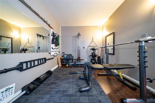 117 1St Street Sw, Carman, MB - Indoor Photo Showing Gym Room