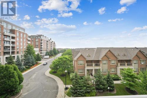 407 - 2480 Prince Michael Drive, Oakville (Iroquois Ridge North), ON - Outdoor With Balcony With Facade