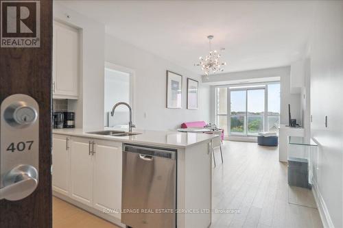 407 - 2480 Prince Michael Drive, Oakville (Iroquois Ridge North), ON - Indoor Photo Showing Kitchen With Double Sink