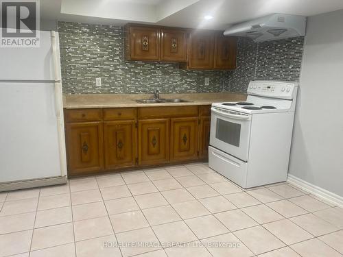 Basemen - 31 Hoseyhill Crescent, Toronto, ON - Indoor Photo Showing Kitchen With Double Sink