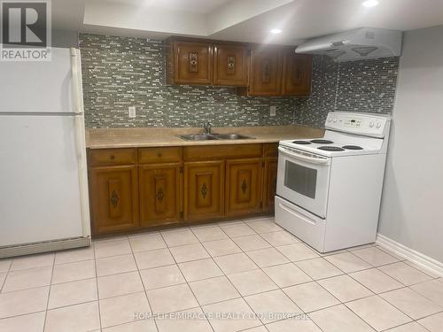 Basemen - 31 Hoseyhill Crescent, Toronto, ON - Indoor Photo Showing Kitchen With Double Sink