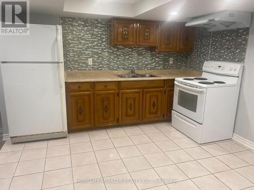 Basemen - 31 Hoseyhill Crescent, Toronto, ON - Indoor Photo Showing Kitchen With Double Sink