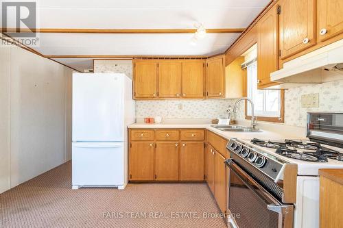 79 Stans Circle, Midland, ON - Indoor Photo Showing Kitchen With Double Sink