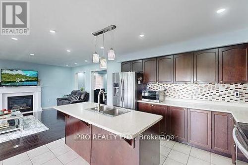 18 Birch Lake Court, Brampton (Bram East), ON - Indoor Photo Showing Kitchen With Fireplace With Double Sink With Upgraded Kitchen