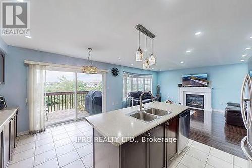 18 Birch Lake Court, Brampton (Bram East), ON - Indoor Photo Showing Kitchen With Fireplace With Double Sink