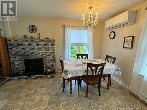 2634 103 Route, Somerville, NB - Indoor Photo Showing Dining Room With Fireplace