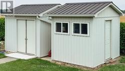 2 Storage Sheds - 