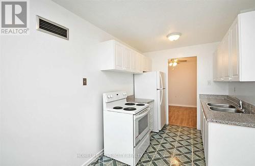 907 - 18 Knightsbridge Road, Brampton (Queen Street Corridor), ON - Indoor Photo Showing Kitchen With Double Sink