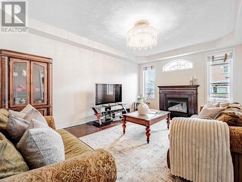 60 Impulse Circle, Brampton (Credit Valley), ON - Indoor Photo Showing Living Room With Fireplace