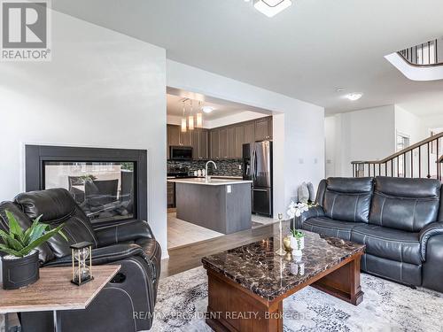 161 Munro Circle E, Brantford, ON - Indoor Photo Showing Living Room With Fireplace