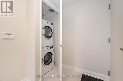 2402 - 30 Gibbs Road, Toronto (Islington-City Centre West), ON - Indoor Photo Showing Laundry Room