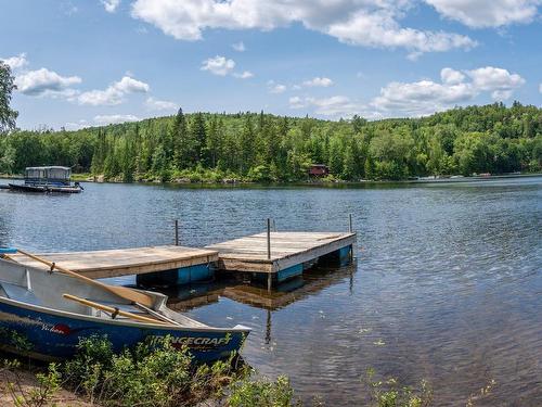 1040 Ch. Beaupré, Lac-Aux-Sables, QC - Outdoor With Body Of Water With View