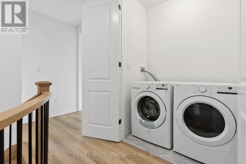 1696 Dance Court, Milton (Bowes), ON - Indoor Photo Showing Laundry Room