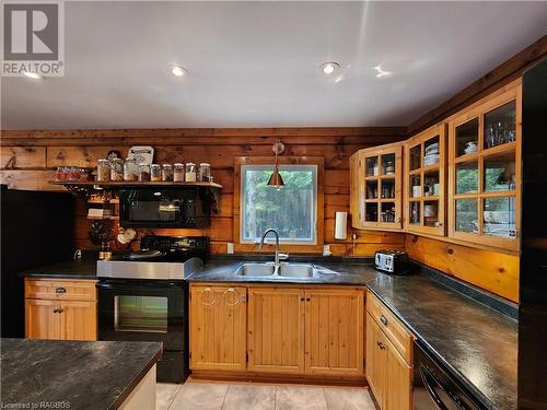 9 Hope Drive, Miller Lake, ON - Indoor Photo Showing Kitchen With Double Sink