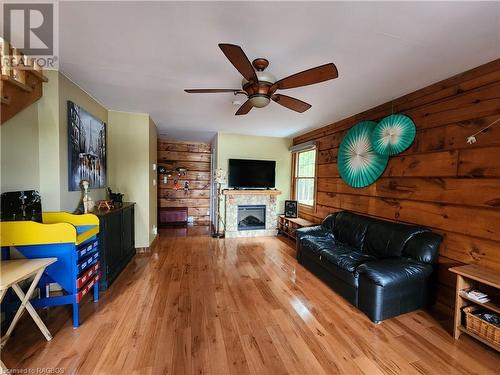 9 Hope Drive, Miller Lake, ON - Indoor Photo Showing Living Room With Fireplace