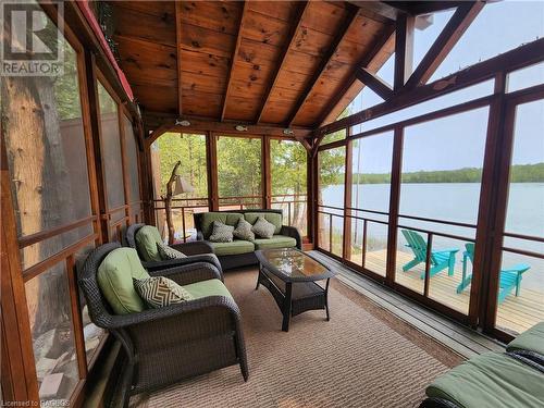 9 Hope Drive, Miller Lake, ON - Indoor Photo Showing Other Room With Body Of Water