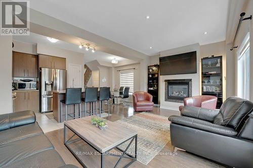 162 Westbank Trail, Hamilton (Stoney Creek Mountain), ON - Indoor Photo Showing Living Room With Fireplace