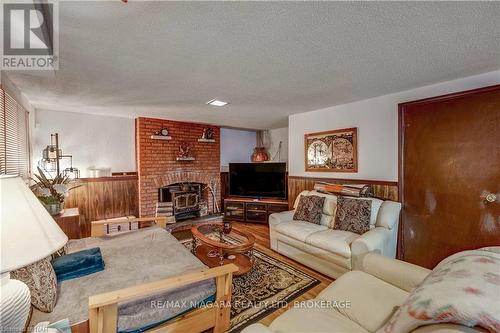 6216 Eldorado Avenue, Niagara Falls, ON - Indoor Photo Showing Living Room With Fireplace