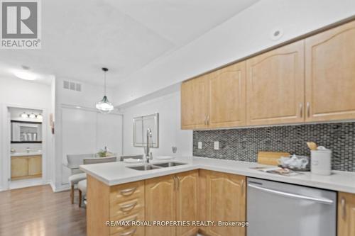 119 - 1496 Victoria Park Avenue, Toronto (Victoria Village), ON - Indoor Photo Showing Kitchen With Double Sink