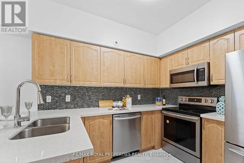 119 - 1496 Victoria Park Avenue, Toronto (Victoria Village), ON - Indoor Photo Showing Kitchen With Stainless Steel Kitchen With Double Sink With Upgraded Kitchen