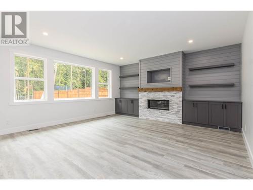 1390 21 Street Ne Lot# 12, Salmon Arm, BC - Indoor Photo Showing Living Room With Fireplace