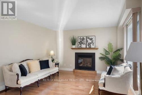 42 Winnifred Avenue, Parry Sound, ON - Indoor Photo Showing Living Room With Fireplace