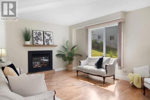 42 Winnifred Avenue, Parry Sound, ON - Indoor Photo Showing Living Room With Fireplace