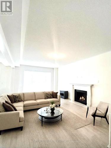 53 Shepherd Drive, Barrie (Painswick South), ON - Indoor Photo Showing Living Room With Fireplace