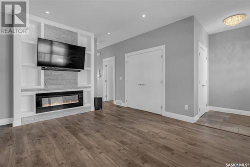 318 Kenaschuk Lane, Saskatoon, SK - Indoor Photo Showing Living Room With Fireplace