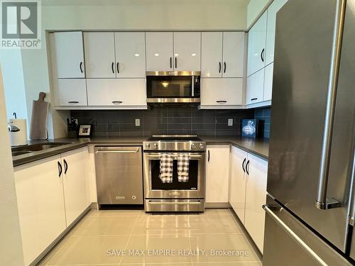 308 - 825 Church Street, Toronto (Rosedale-Moore Park), ON - Indoor Photo Showing Kitchen With Stainless Steel Kitchen