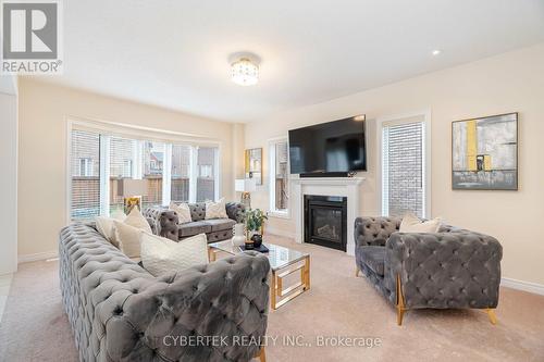 8 Tetra Court, Brampton (Credit Valley), ON - Indoor Photo Showing Living Room With Fireplace