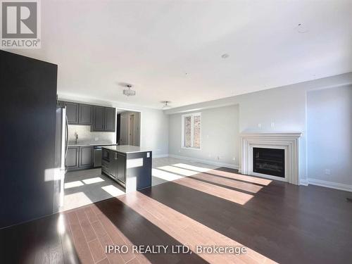 30 Periwinkle Road W, Springwater (Midhurst), ON - Indoor Photo Showing Other Room With Fireplace