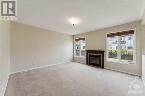 215 Huntsville Drive, Ottawa, ON - Indoor Photo Showing Other Room With Fireplace