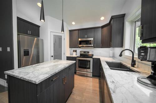 24 Millar Drive, Ste Anne Rm, MB - Indoor Photo Showing Kitchen With Double Sink With Upgraded Kitchen